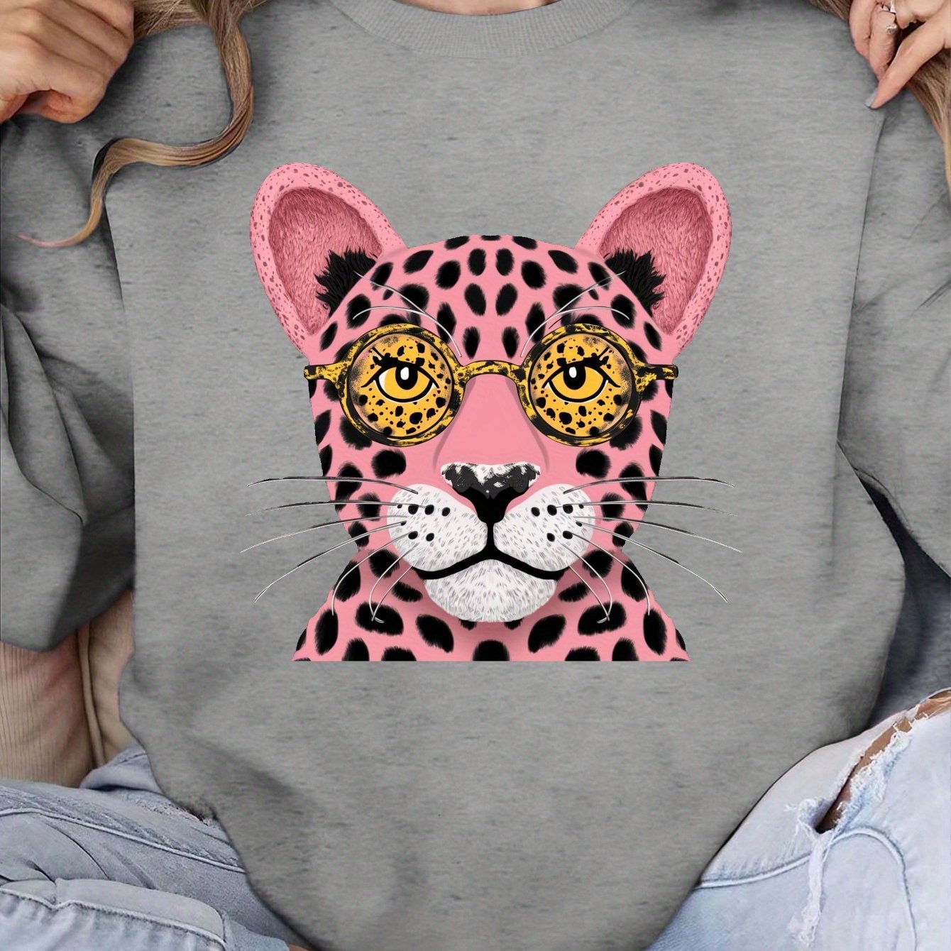 Stylized pink leopard face women's sweatshirts