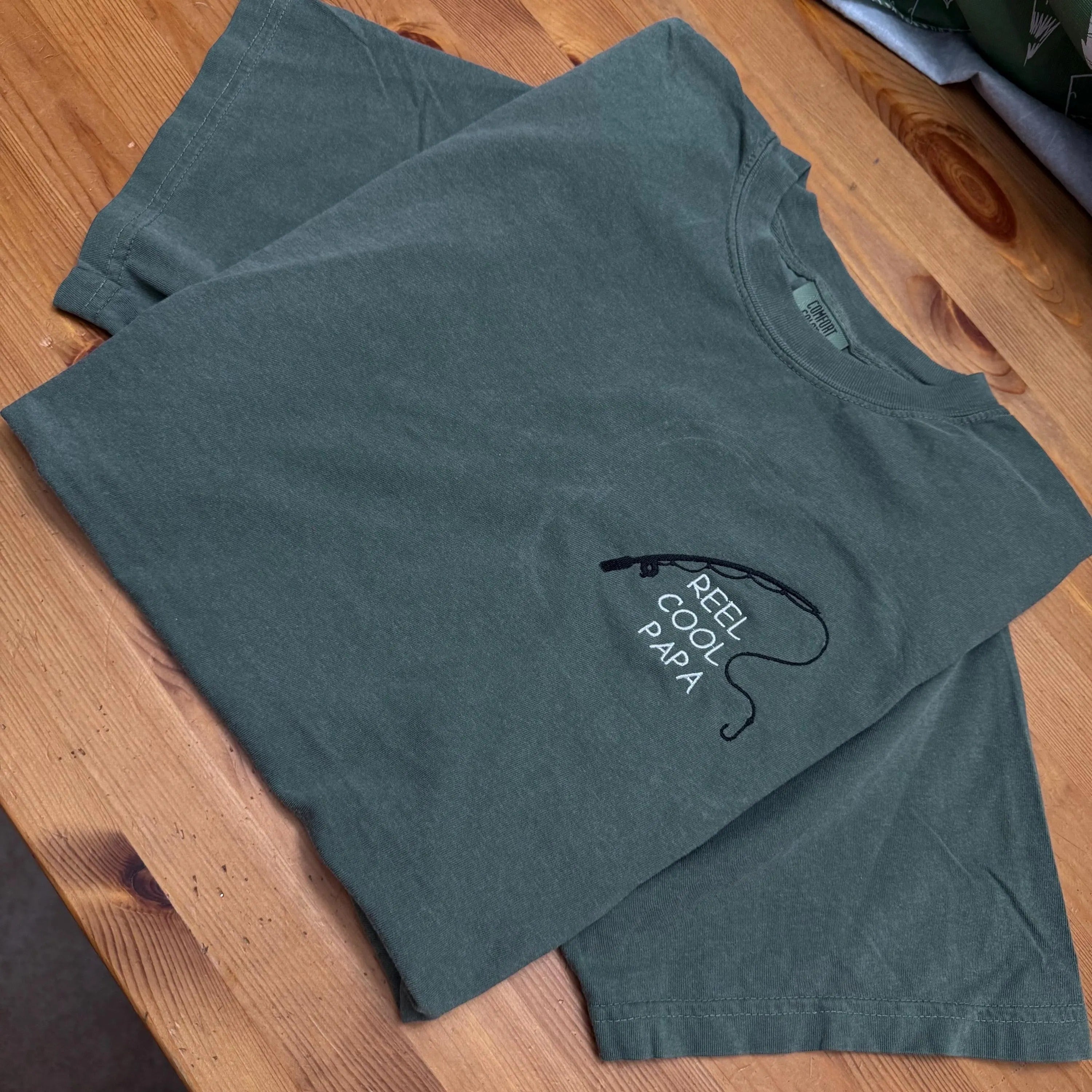 Reel Cool Papa Embroidered T-Shirt - Y2K Style | unisex T-shirt Comfort Colors- funny clothing- gift for him -Fathers Day- Fishing Shirt