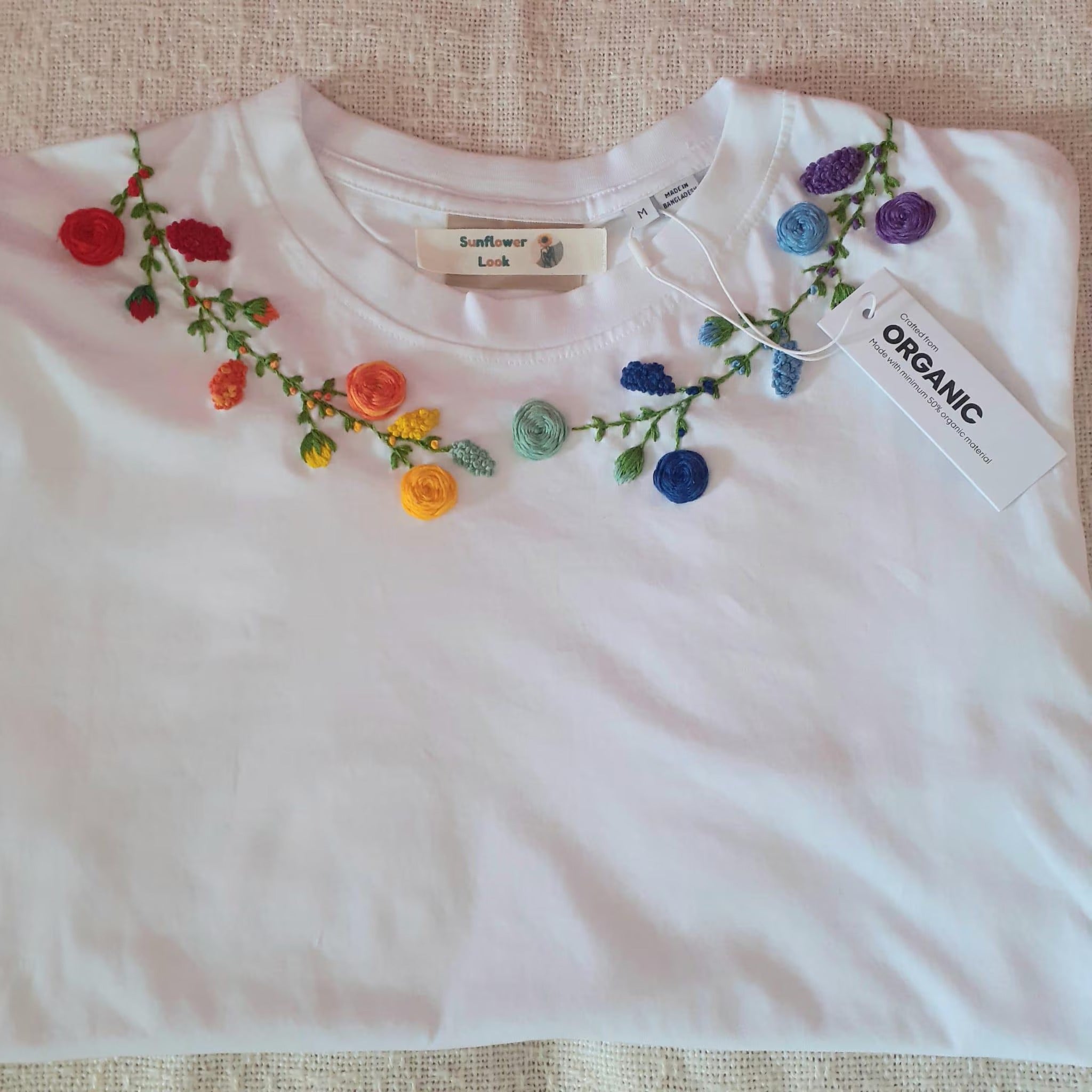 Customized and hand embroidered t-shirt. Organic cotton.