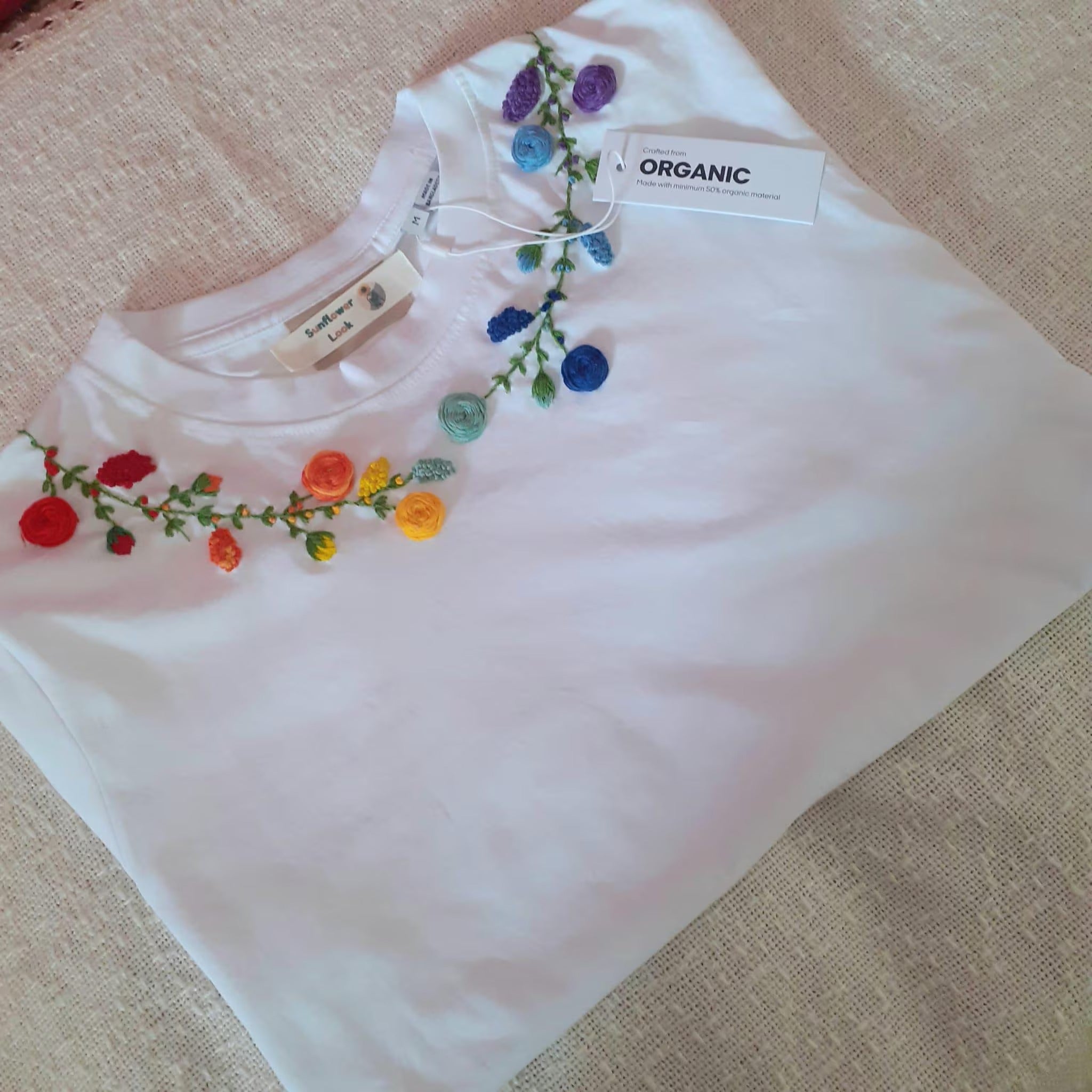Customized and hand embroidered t-shirt. Organic cotton.
