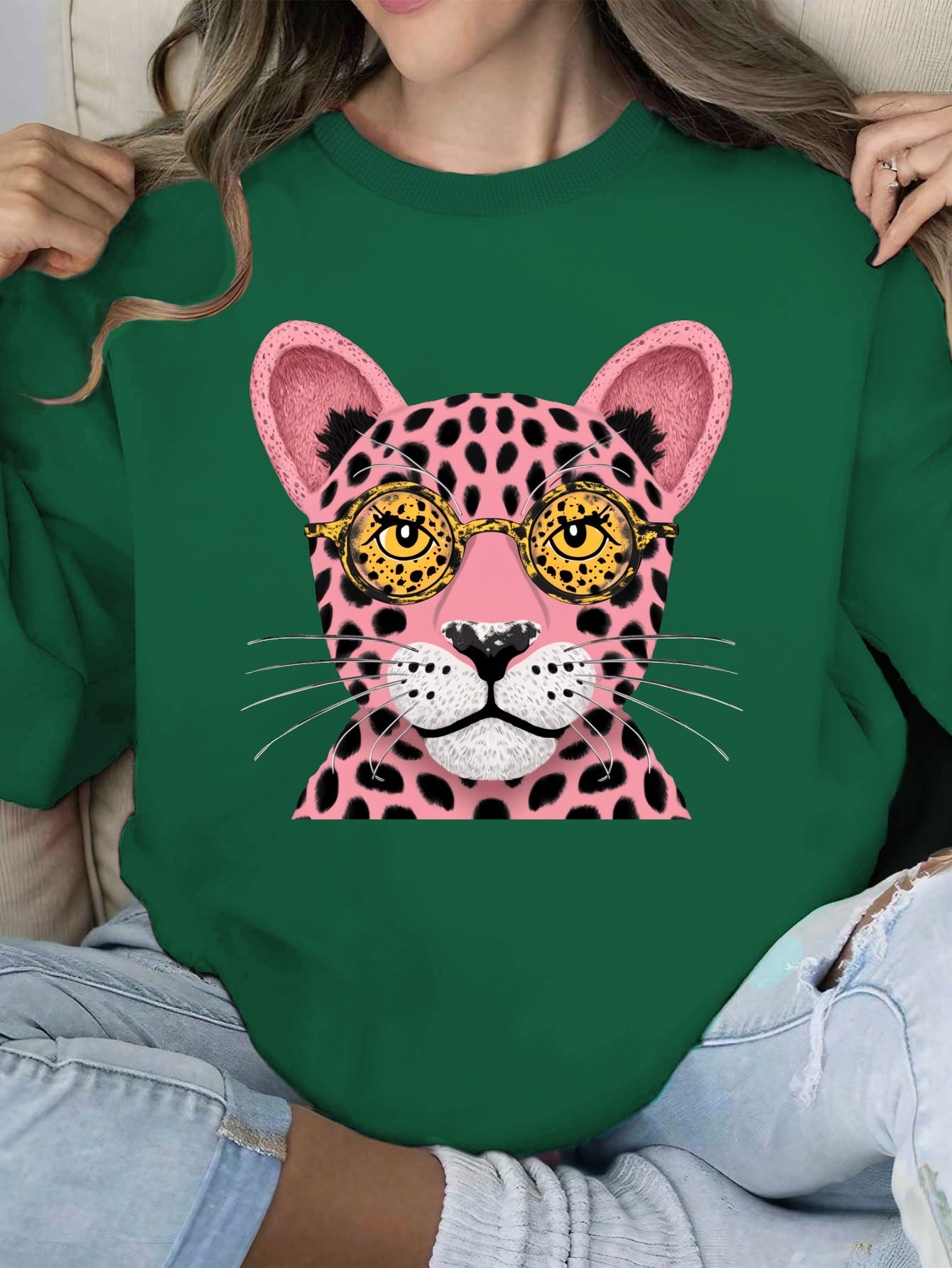 Stylized pink leopard face women's sweatshirts