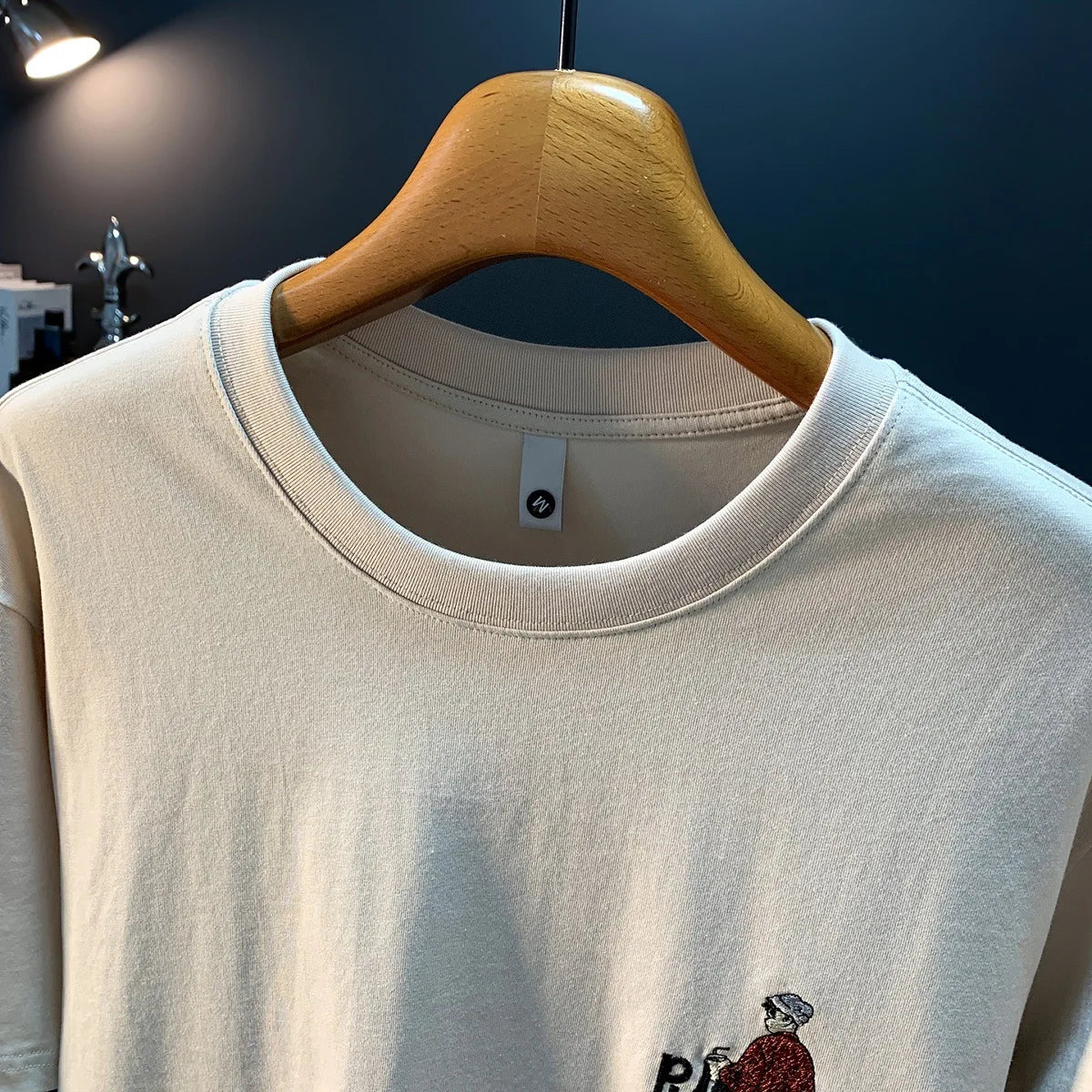 Embroidered printed short sleeved T-shirt for men's summer new style, loose and versatile, casual and breathable men's top
